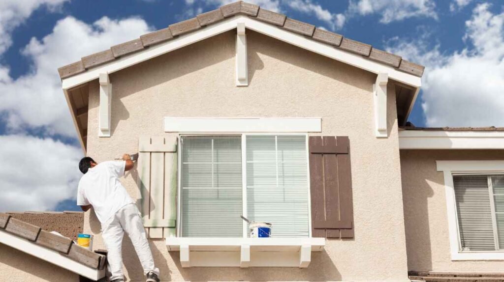 Painters using weather-resistant eco paints on Palm Jumeirah villa exposed to humidity and coastal air.